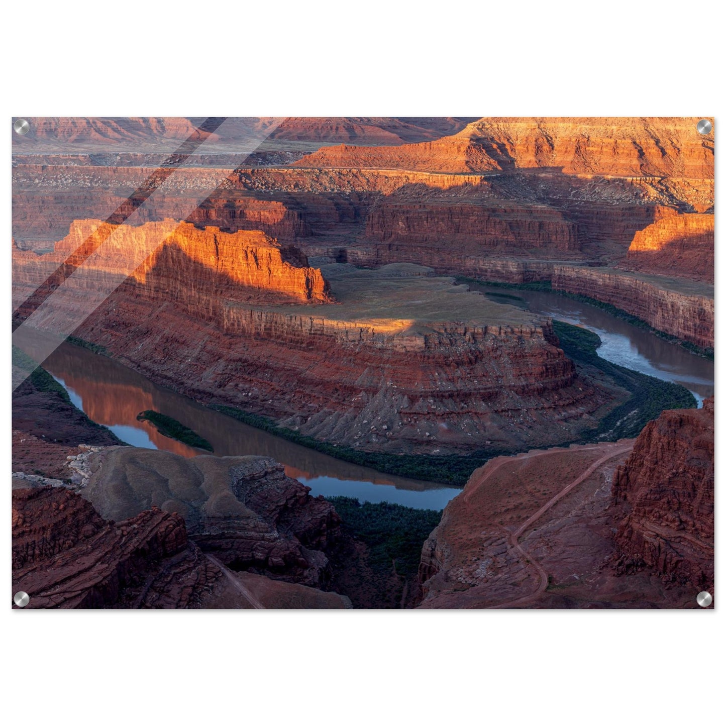 Awe-Inspiring Photography of the Grand Canyon capturing the layers of eroded rock formations, where warm hues of red and orange dance gracefully creating a dramatic tapestry of geological wonder. Acrylic.
