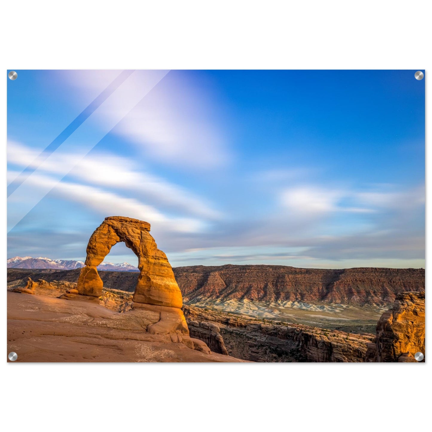 A captivating photography that highlights the stunning topography of the Grand Canyon showcasing a beautifully imperfect natural arch, gracefully formed at the edge of the canyon. Acrylic.