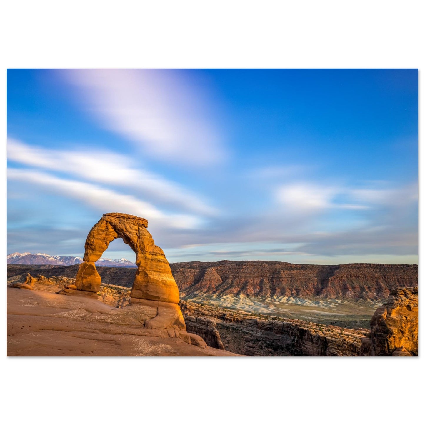 A captivating photography that highlights the stunning topography of the Grand Canyon showcasing a beautifully imperfect natural arch, gracefully formed at the edge of the canyon. Poster.