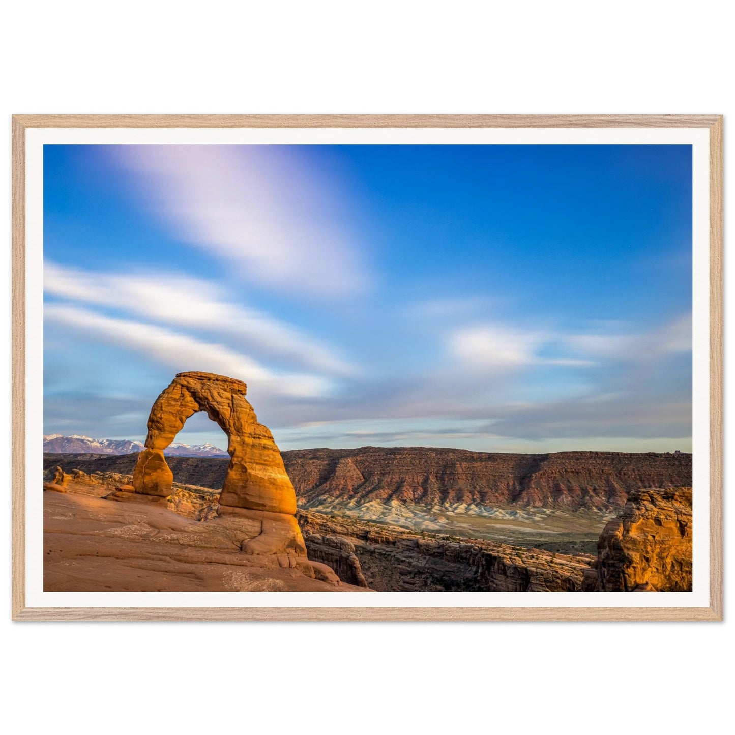 A captivating photography that highlights the stunning topography of the Grand Canyon showcasing a beautifully imperfect natural arch, gracefully formed at the edge of the canyon. Poster. Frame.