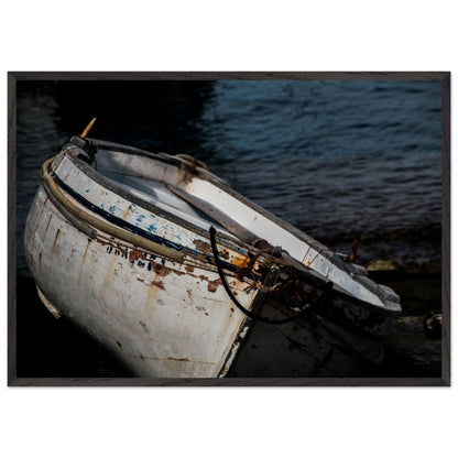 A fine photography of a boat with white and blue details surrounded by water printed in high quality paper and frame