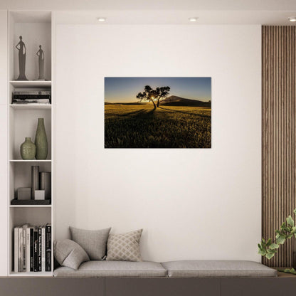 Modern living room with a wall art of a tree in a field.