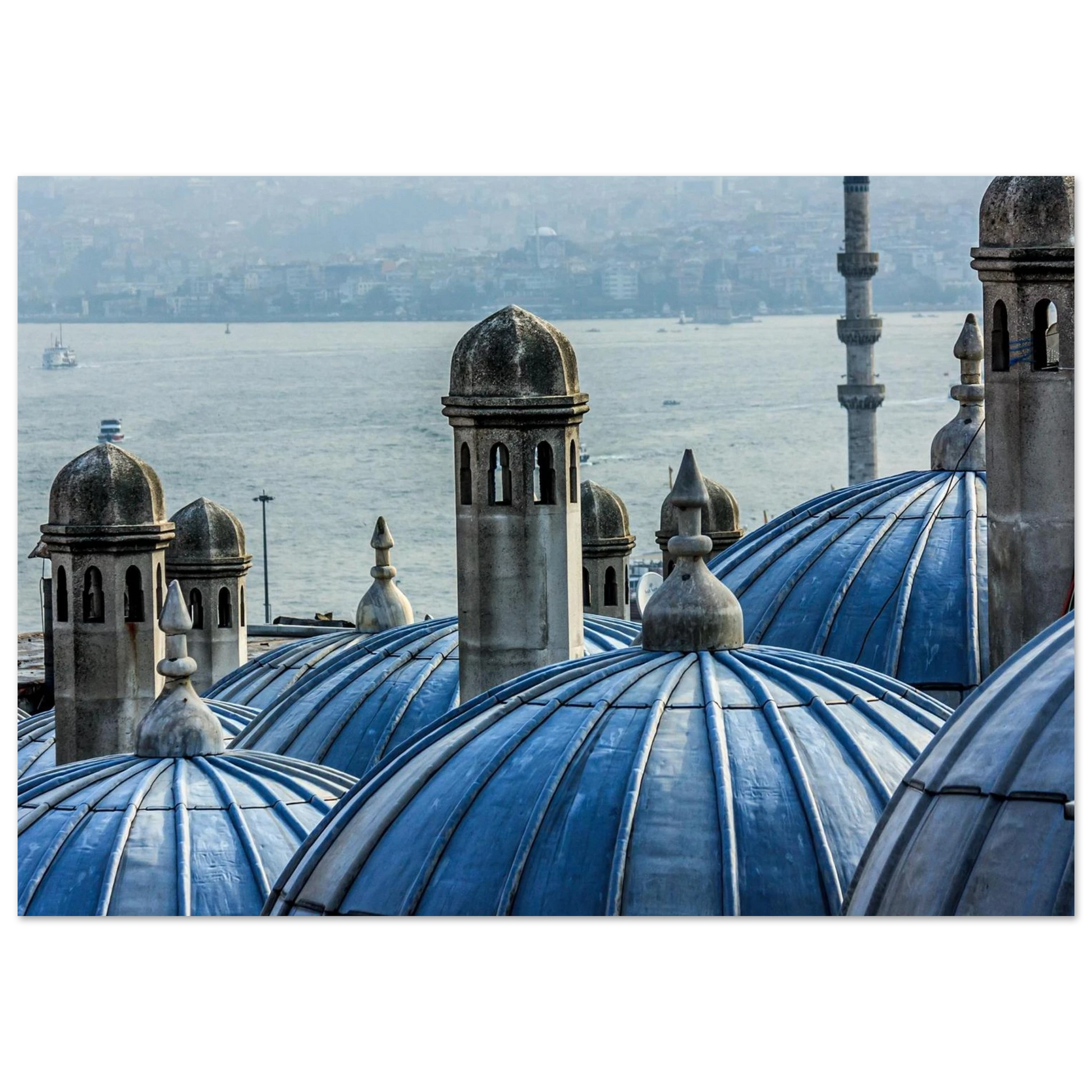 Fine art photo of soft blue domes overlooking the sea and city, minimalist and bohemian style