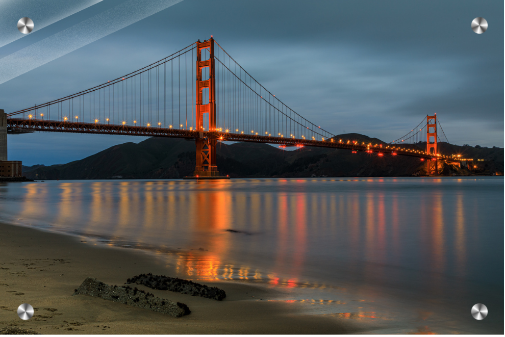 Golden Gate Bridge at night with reflection in water, San Francisco