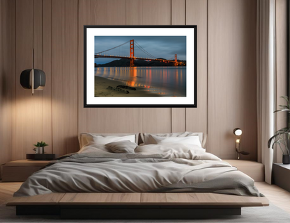 Modern bedroom with a framed picture of a bridge on the wall.
