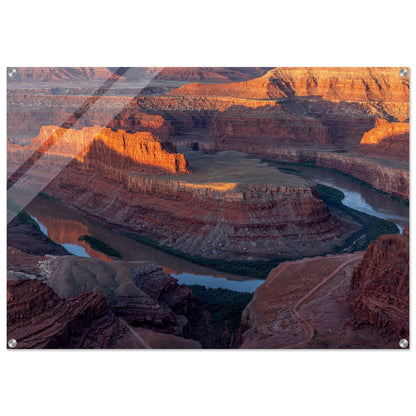 Awe-Inspiring Photography of the Grand Canyon capturing the layers of eroded rock formations, where warm hues of red and orange dance gracefully creating a dramatic tapestry of geological wonder. Acrylic.