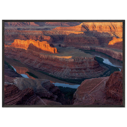 Awe-Inspiring Photography of the Grand Canyon capturing the layers of eroded rock formations, where warm hues of red and orange dance gracefully creating a dramatic tapestry of geological wonder. Poster. Frame