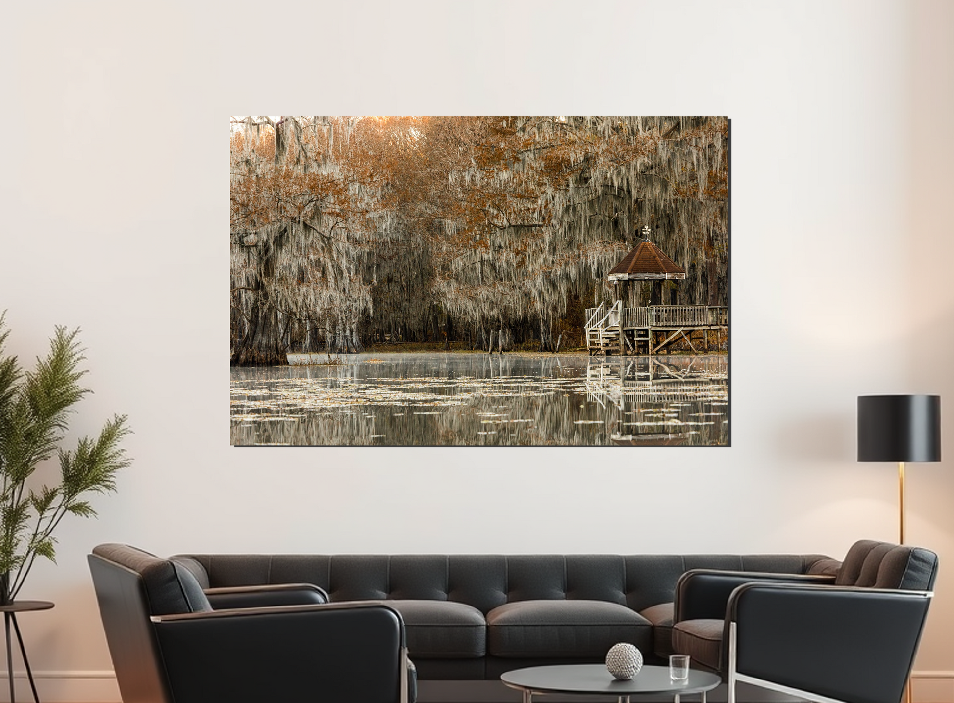 Living room with a large wall art piece depicting a natural landscape.