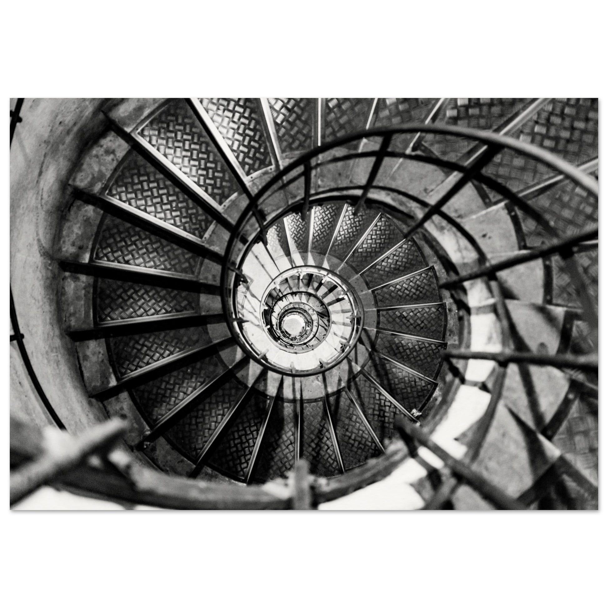 A Black and white photography of an  elegant spiral staircase. Customized size and museum-quality poster, metallic, or acrylic material.