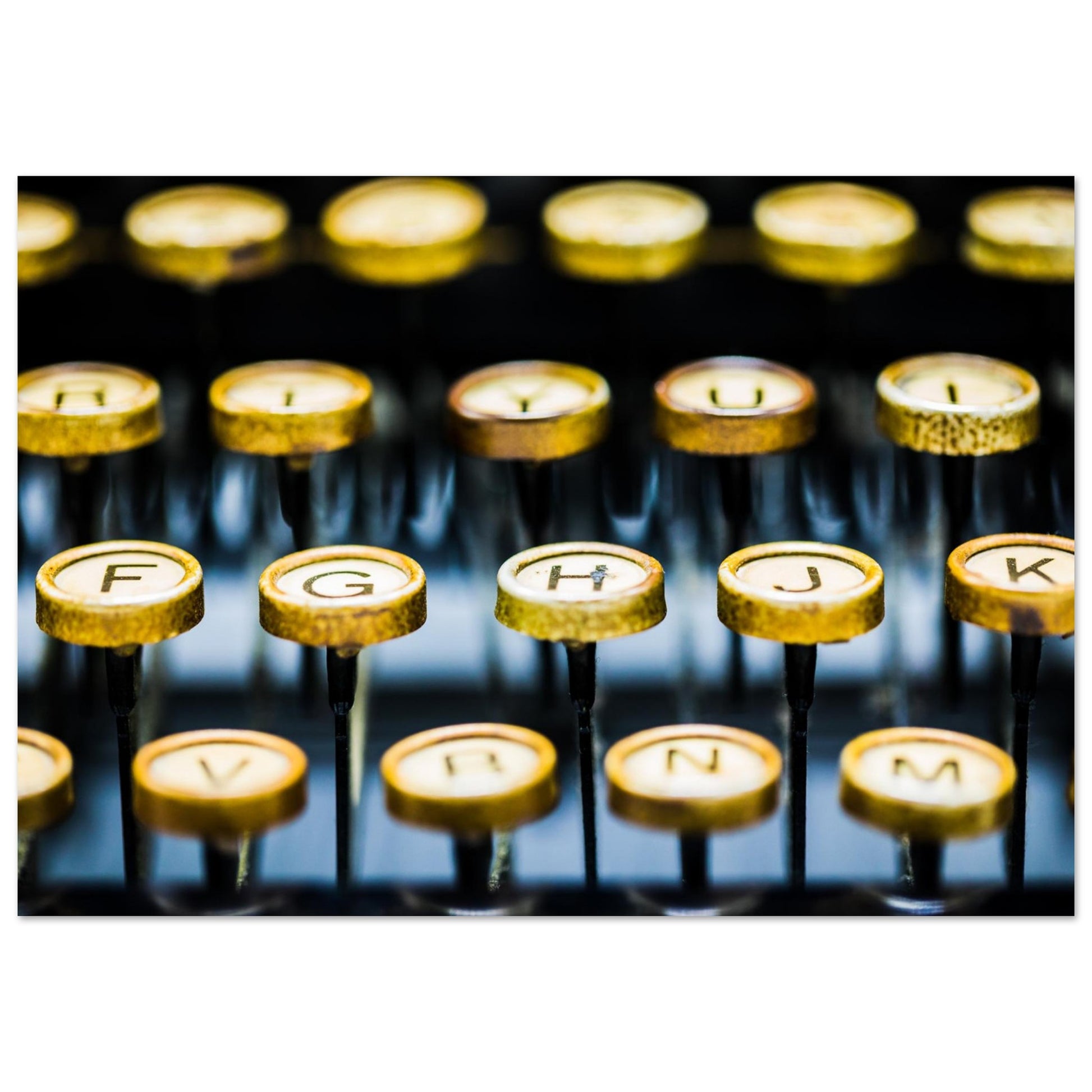 This evocative photograph reveals a stunning golden keyboard, its keys worn smooth by the countless words and narratives crafted over time. Bring a touch of elegance and inspiration to any space. Poster.
