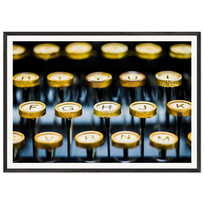 This evocative photograph reveals a stunning golden keyboard, its keys worn smooth by the countless words and narratives crafted over time. Bring a touch of elegance and inspiration to any space. Poster. Frame.