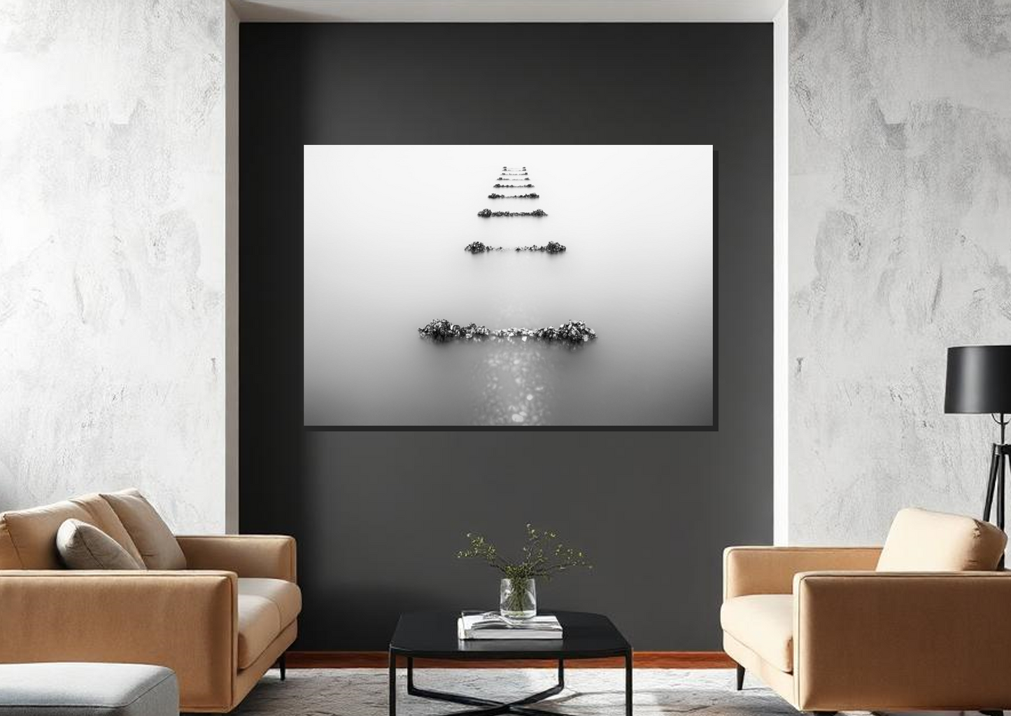 Modern living room with a black and white abstract painting on a gray wall.